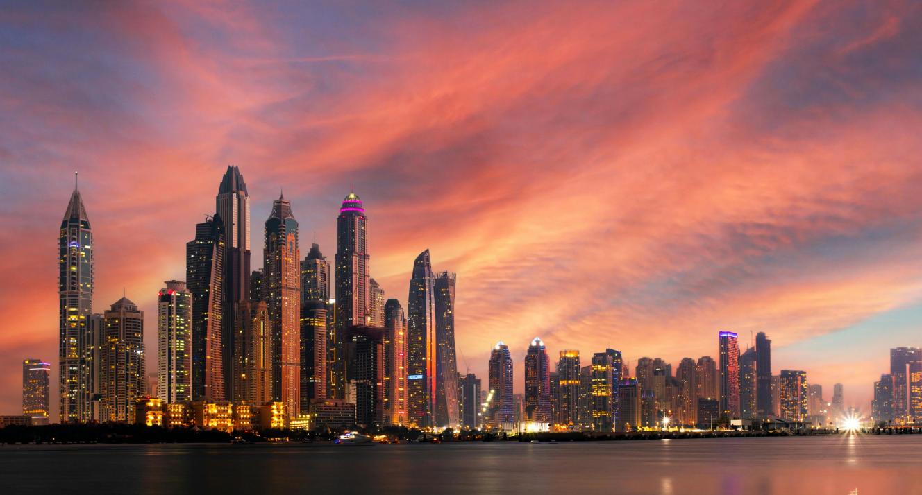 Dubai skyscrapers at night by Aleksandar Pasaric